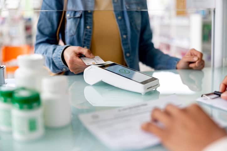 customer paying for a prescription